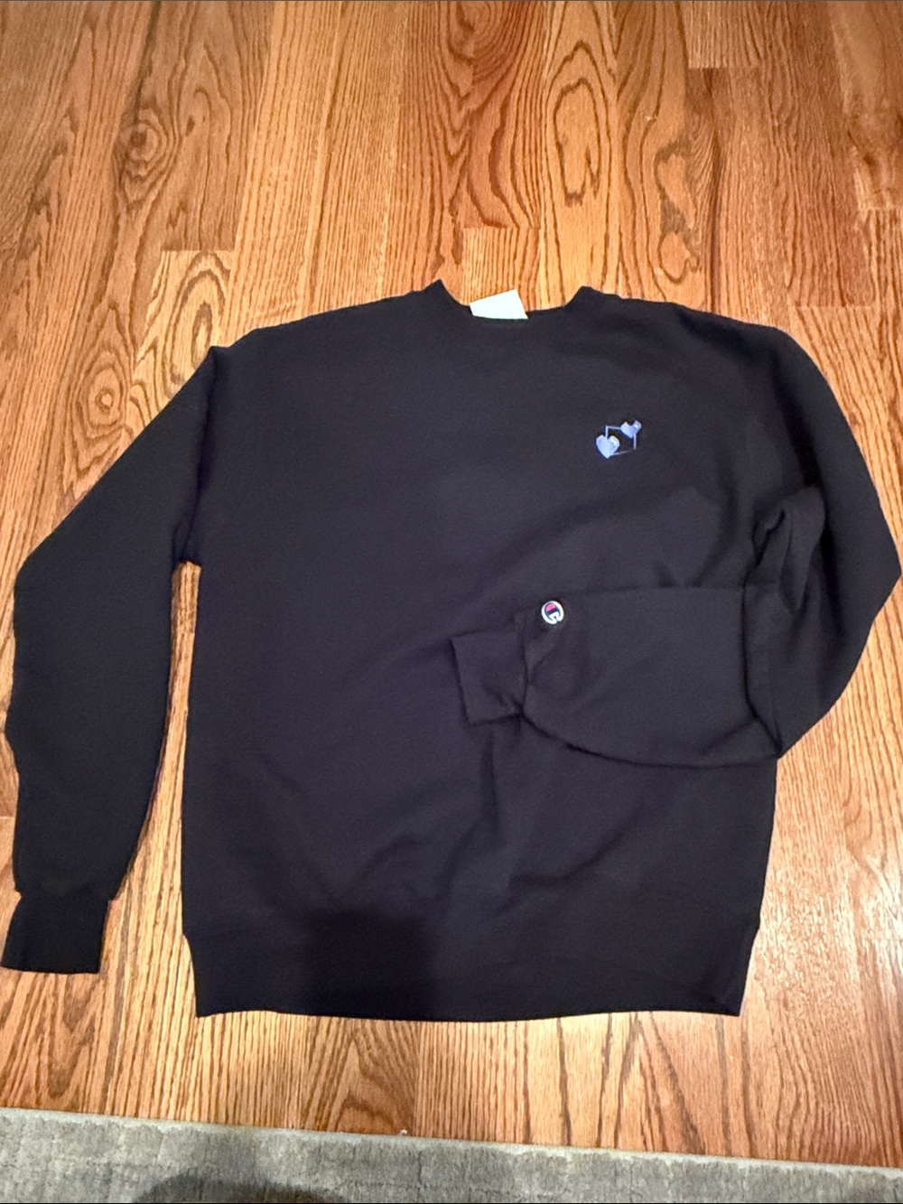 Woman’s champion sweatshirt with embroidered heart logo